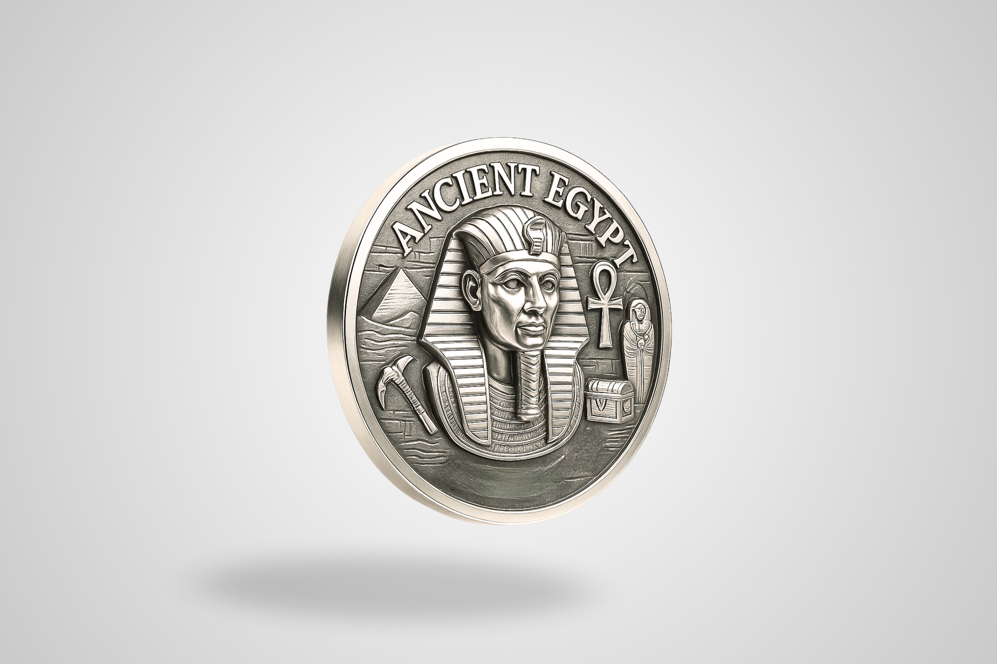 A photo of a silver metal token with 3D effect
