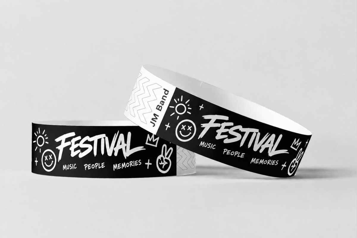 Zwee schwaarz Pabeieraarmbänner mat wäissem Festival-Drock
